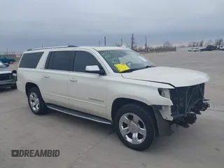 2015 Chevrolet Suburban LTZ with VIN 1GNSCKKC7FR641421, listed as a IAAI auction lot 41637137 with 139,001 mi miles and . Bid and sale history available at DreamBid. Image 13.