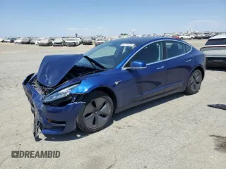 2018 Tesla Model 3 Long Range Battery z VIN 5YJ3E1EA4JF056385, wystawiony jako Copart lot #60174535 z przebiegiem 79 840 mil mil oraz Czysty tytuł • Clean title. Historia ofert i sprzedaży dostępna na DreamBid. Obrazek 1.
