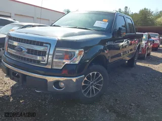 2014 Ford F-150 XL with VIN 1FTFW1EF7EFC89605, listed as a IAAI auction lot 41761440 with 218,753 mi miles. Bid and sale history available at carsss.com. Image 17.