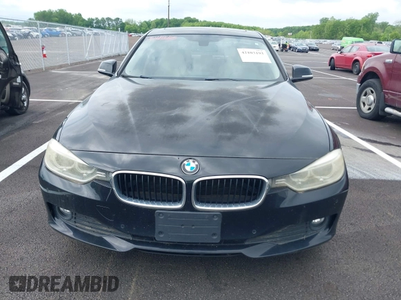2015 BMW 3 Series 320i with VIN WBA3B1G57FNT05826, listed as a IAAI auction lot 42103193 with 128,800 mi miles. Bid and sale history available at carsss.com. Image 11.