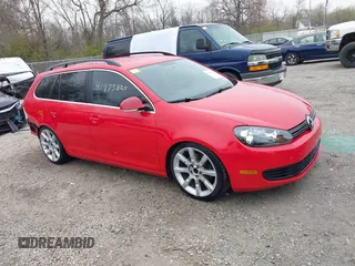 2012 Volkswagen Jetta SportWagen TDI w/Sunroof with VIN 3VWPL7AJ8CM671484, listed as a IAAI auction lot 41973825 with 155,220 mi miles. Bid and sale history available at carsss.com. Image 14.