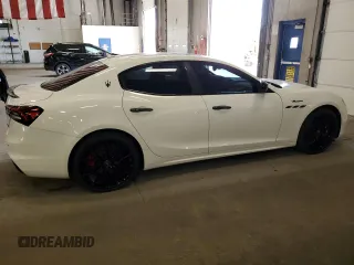 2023 Maserati Ghibli Modena z VIN ZAM57YSMXPX411516, wystawiony jako Copart lot #58330765 z przebiegiem Nie podano mil oraz Szkoda całkowita • Salvage title. Historia ofert i sprzedaży dostępna na DreamBid. Obrazek 3.