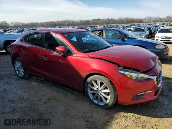 2017 Mazda 3 Grand Touring with VIN JM1BN1M35H1111878, listed as a Copart auction lot 43027565 with 95,653 mi miles and Salvage Title. Bid and sale history available at DreamBid. Image 4.