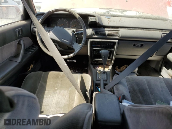 1990 Toyota Camry LE ECT z VIN JT2SV22E0L0351440, wystawiony jako Copart lot #70768614 z przebiegiem 176 239 mil mil oraz Szkoda całkowita • Salvage title. Historia ofert i sprzedaży dostępna na DreamBid. Obrazek 8.