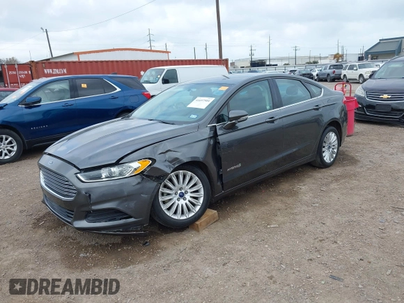 2016 Ford Fusion SE Hybrid with VIN 3FA6P0LU5GR235241, listed as a IAAI auction lot 41697504 with 165,510 mi miles. Bid and sale history available at carsss.com. Image 17.