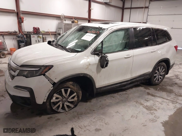 2021 Honda Pilot EX-L with VIN 5FNYF5H57MB040081, listed as a IAAI auction lot 41292215 with 72,639 mi miles. Bid and sale history available at carsss.com. Image 17.