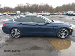 2016 BMW 4 Series 428i xDrive with VIN WBA4C9C59GG137067, listed as a IAAI auction lot 41913733 with 104,378 mi miles and . Bid and sale history available at carsss.com. Image 13.