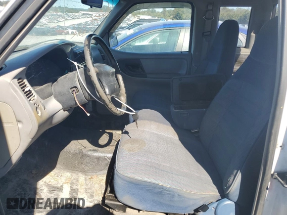 1997 Ford Ranger XL with VIN 1FTCR15U3VPA39507, listed as a Copart auction lot 74720434 with 156,144 mi miles and Salvage title. Bid and sale history available at DreamBid. Image 7.