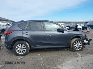 2014 Mazda CX-5 Touring with VIN JM3KE4CY6E0387767, listed as a IAAI auction lot 41698128 with 1 mi miles. Bid and sale history available at carsss.com. Image 14.