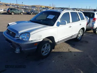 2002 Hyundai Santa Fe GLS with VIN KM8SC73D82U294374, listed as a IAAI auction lot 41204011 with 179,219 mi miles. Bid and sale history available at carsss.com. Image 18.