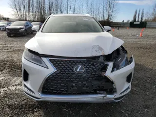 2021 Lexus RX with VIN JTJHZKFA5M2033300, listed as a Copart auction lot 47238435 with 61,452 mi miles and Salvage Title. Bid and sale history available at carsss.com. Image 5.