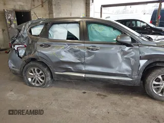 2019 Hyundai Santa Fe SE with VIN 5NMS2CAD7KH094144, listed as a IAAI auction lot 41984633 with 46,307 mi miles and . Bid and sale history available at DreamBid. Image 13.