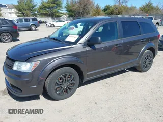 2017 Dodge Journey SE with VIN 3C4PDCAB0HT701026, listed as a IAAI auction lot 41797969 with 80,477 mi miles and . Bid and sale history available at DreamBid. Image 2.