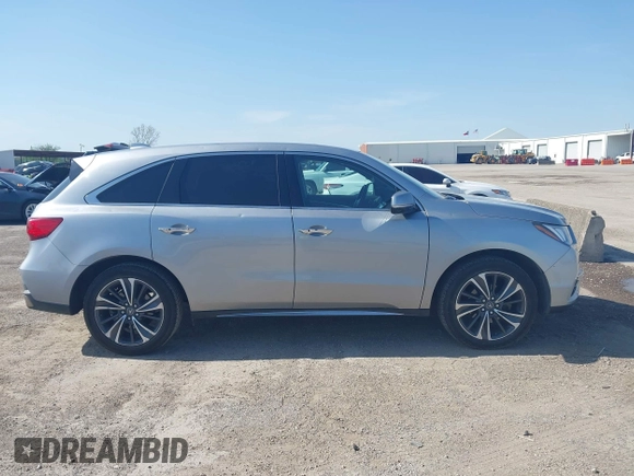 2020 Acura MDX Technology with VIN 5J8YD3H59LL005131, listed as a IAAI auction lot 41916686 with 80,126 mi miles and . Bid and sale history available at DreamBid. Image 13.