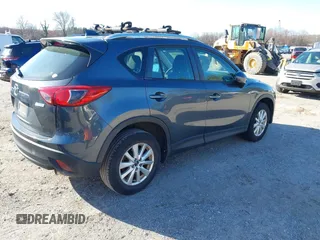 2013 Mazda CX-5 Sport z VIN JM3KE4BE3D0141748, wystawiony jako IAAI lot #41836498 z przebiegiem 163 118 mil mil oraz . Historia ofert i sprzedaży dostępna na DreamBid. Obrazek 4.