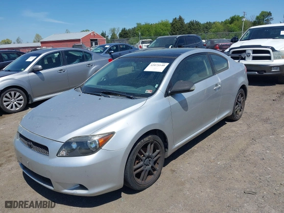 2006 Scion tC with VIN JTKDE177060139123, listed as a IAAI auction lot 42075140 with 218,391 mi miles. Bid and sale history available at carsss.com. Image 2.