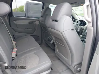 2015 Chevrolet Traverse LS z VIN 1GNKRFKDXFJ107942, wystawiony jako IAAI lot #42111246 z przebiegiem 128 036 mil mil oraz . Historia ofert i sprzedaży dostępna na DreamBid. Obrazek 8.