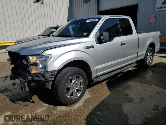 2015 Ford F-150 XL with VIN 1FTEX1C88FFC26544, listed as a Copart auction lot 48242705 with 124,731 mi miles and Salvage Title. Bid and sale history available at carsss.com. Image 1.