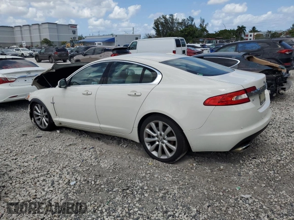 2009 Jaguar XF with VIN SAJXA06B79HR44382, listed as a Copart auction lot 53041205 with 121,245 mi miles and Salvage Title. Bid and sale history available at DreamBid. Image 2.