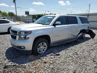 2015 Chevrolet Suburban LT with VIN 1GNSCJKC9FR309149, listed as a Copart auction lot 51747285 with 208,805 mi miles and Salvage title. Bid and sale history available at DreamBid. Image 1.