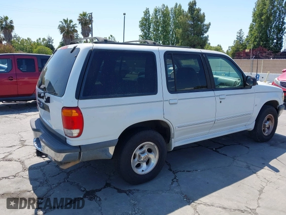 1998 Ford Explorer XLT z VIN 1FMZU32P6WZA04805, wystawiony jako IAAI lot #42569869 z przebiegiem 481 669 mil mil oraz . Historia ofert i sprzedaży dostępna na DreamBid. Obrazek 4.