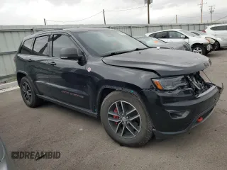 2017 Jeep Grand Cherokee Trailhawk with VIN 1C4RJFLT5HC692439, listed as a Copart auction lot 81093534 with 135,493 mi miles and Salvage title. Bid and sale history available at DreamBid. Image 4.
