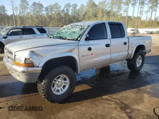 2002 Dodge Dakota SLT with VIN 1B7HG48N42S588224, listed as a Copart auction lot 87807265 with 69,817 mi miles and Salvage Title. Bid and sale history available at carsss.com. Image 1.