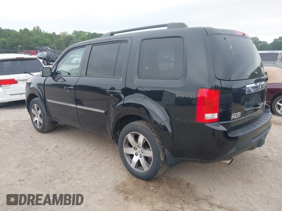 2015 Honda Pilot Touring with VIN 5FNYF4H9XFB036493, listed as a IAAI auction lot 42190624 with 223,675 mi miles and . Bid and sale history available at DreamBid. Image 3.