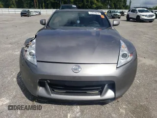 2010 Nissan 370Z Touring with VIN JN1AZ4EH8AM501134, listed as a Copart auction lot 73919614 with 106,599 mi miles and Salvage Title. Bid and sale history available at carsss.com. Image 5.