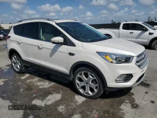 2019 Ford Escape Titanium with VIN 1FMCU9J92KUA55656, listed as a Copart auction lot 52233235 with 57,052 mi miles and Non Repairable. Bid and sale history available at carsss.com. Image 4.