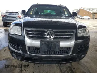 2010 Volkswagen Touareg VR6 with VIN WVGBF7A98AD001321, listed as a Copart auction lot 48949685 with 101,944 mi miles and Salvage Title. Bid and sale history available at DreamBid. Image 5.