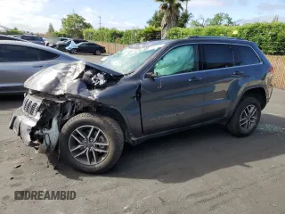 2019 Jeep Grand Cherokee Altitude with VIN 1C4RJFAG5KC591141, listed as a Copart auction lot 56885105 with 88,000 mi miles and Salvage title. Bid and sale history available at DreamBid. Image 1.
