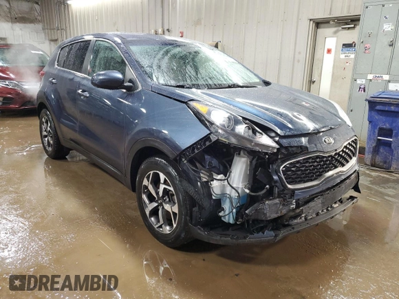 2020 Kia Sportage LX with VIN KNDPM3AC2L7689662, listed as a Copart auction lot 50983135 with 59,395 mi miles and Salvage Title. Bid and sale history available at DreamBid. Image 4.