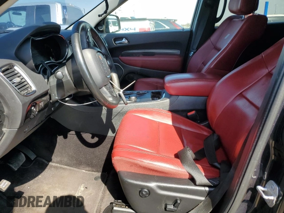 2016 Dodge Durango Limited with VIN 1C4RDJDG4GC424587, listed as a Copart auction lot 54211245 with 144,682 mi miles and Salvage title. Bid and sale history available at DreamBid. Image 7.