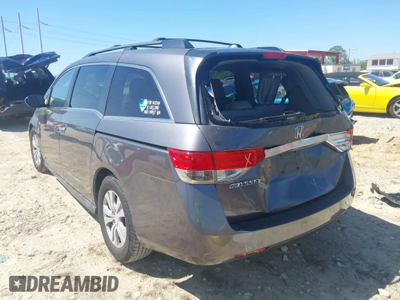 2015 Honda Odyssey EX-L with VIN 5FNRL5H61FB048170, listed as a IAAI auction lot 41822798 with 179,550 mi miles and . Bid and sale history available at DreamBid. Image 3.