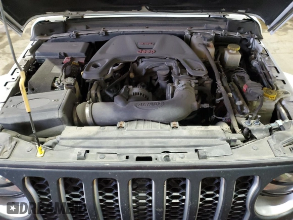 2020 Jeep Gladiator Overland z VIN 1C6HJTFG6LL135872, wystawiony jako Copart lot #59249895 z przebiegiem 113 519 mil mil oraz Czysty tytuł • Clean title. Historia ofert i sprzedaży dostępna na DreamBid. Obrazek 12.