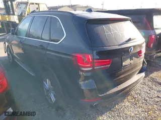 2015 BMW X5 sDrive35i with VIN 5UXKR2C54F0H35124, listed as a IAAI auction lot 41885474 with 88,865 mi miles. Bid and sale history available at carsss.com. Image 3.