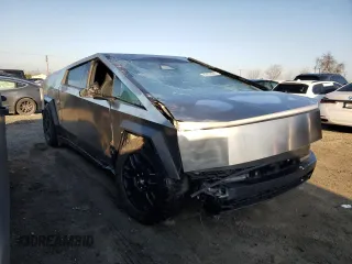 2024 Tesla Cybertruck z VIN 7G2CEHEDXRA013484, wystawiony jako Copart lot #43263285 z przebiegiem 2 869 mil mil oraz Szkoda całkowita • Salvage title. Historia ofert i sprzedaży dostępna na DreamBid. Obrazek 4.