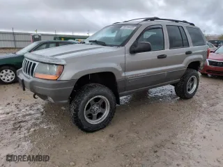 1999 Jeep Grand Cherokee Laredo with VIN 1J4GW58SXXC553547, listed as a Copart auction lot 50786405 with 151,968 mi miles and Salvage Title. Bid and sale history available at carsss.com. Image 1.