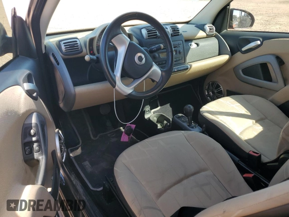 2008 Smart fortwo Pure z VIN WMEEJ31X78K123537, wystawiony jako Copart lot #48391295 z przebiegiem 94 051 mil mil oraz Szkody całkowita. Historia ofert i sprzedaży dostępna na DreamBid. Obrazek 8.