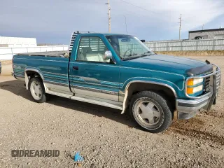 1994 GMC Sierra 1500 with VIN 1GTEK14K5RE539652, listed as a Copart auction lot 80877094 with 162,533 mi miles and Salvage Title. Bid and sale history available at DreamBid. Image 4.