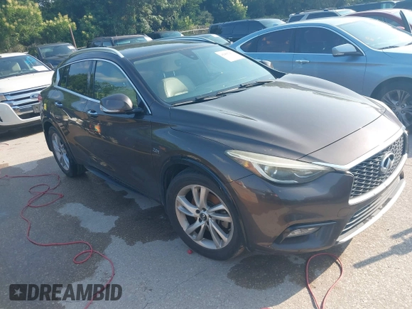 2017 Infiniti QX30 Premium z VIN SJKCH5CP4HA023330, wystawiony jako IAAI lot #42407253 z przebiegiem 132 317 mil mil oraz . Historia ofert i sprzedaży dostępna na DreamBid. Obrazek 1.