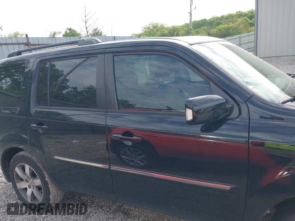 2013 Honda Pilot Touring with VIN 5FNYF3H93DB031630, listed as a IAAI auction lot 42237899 with 198,523 mi miles and . Bid and sale history available at DreamBid. Image 14.