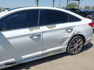 2015 Hyundai Sonata Sport with VIN 5NPE34ABXFH195251, listed as a IAAI auction lot 42002496 with 142,381 mi miles and . Bid and sale history available at carsss.com. Image 6.