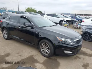 2012 Kia Optima LX with VIN KNAGM4A72C5291451, listed as a IAAI auction lot 42068559 with 121,548 mi miles and . Bid and sale history available at carsss.com. Image 1.