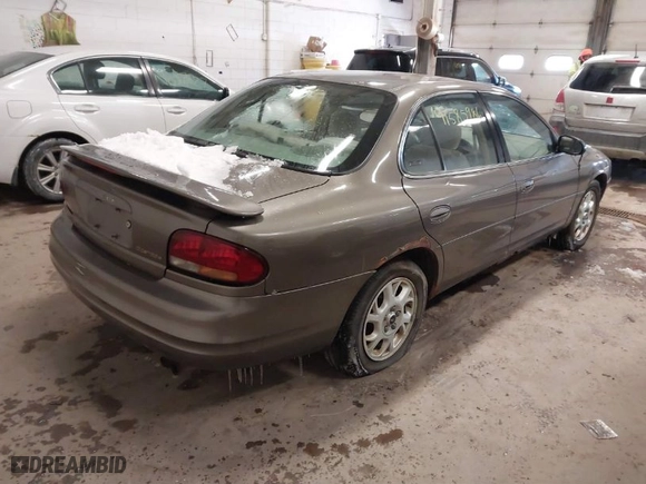 2002 Oldsmobile Intrigue GX with VIN 1G3WH52H12F206561, listed as a IAAI auction lot 41585986 with 172,331 mi miles. Bid and sale history available at carsss.com. Image 4.