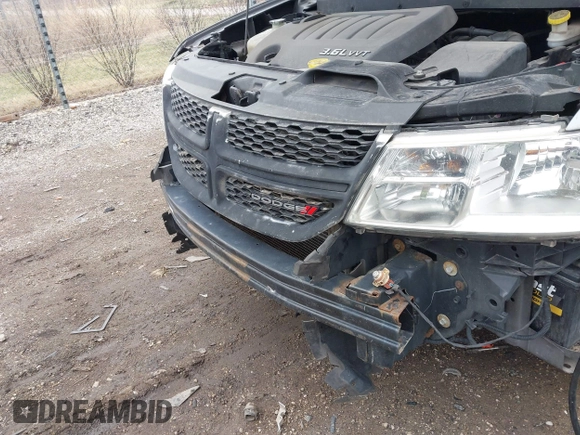 2013 Dodge Journey SXT with VIN 3C4PDDBGXDT519196, listed as a IAAI auction lot 41885545 with 185,180 mi miles and . Bid and sale history available at DreamBid. Image 16.