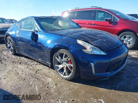 2014 Nissan 370Z Nismo with VIN JN1AZ4EH9EM635608, listed as a IAAI auction lot 41333034 with 45,354 mi miles and . Bid and sale history available at DreamBid. Image 1.