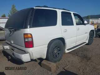 2003 GMC Yukon Denali z VIN 1GKEK63U73J336989, wystawiony jako IAAI lot #42170538 z przebiegiem Nie podano mil oraz . Historia ofert i sprzedaży dostępna na DreamBid. Obrazek 4.