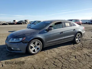 2013 Volkswagen CC Sport with VIN WVWBP7ANXDE525051, listed as a Copart auction lot 70659744 with 293,611 mi miles and Salvage Title. Bid and sale history available at DreamBid. Image 1.
